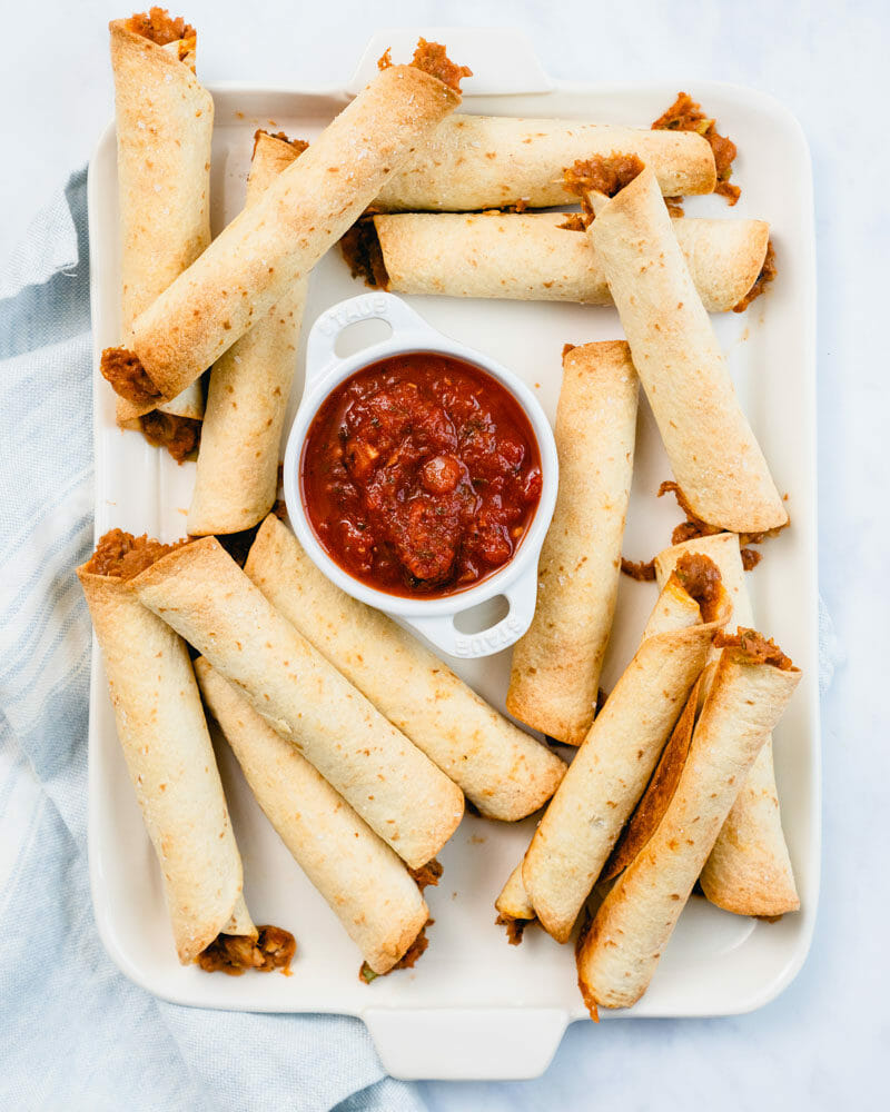 Baked flautas (taquitos) with bean filling