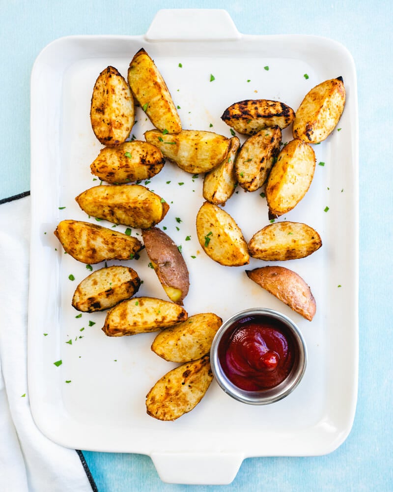 Grilled potatoes on platter