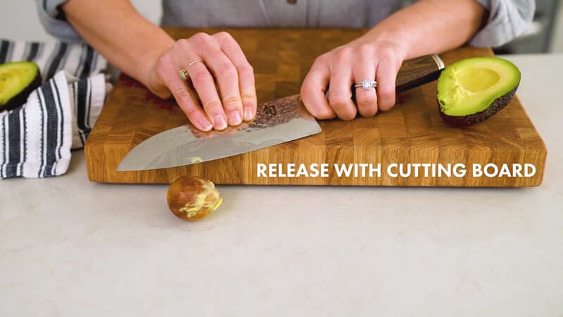 How to Cut an Avocado | release the pit using the cutting board